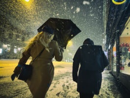 Two women in a snow storm.web