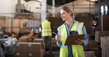 Warehouse Owner Inspecting Inventory.web