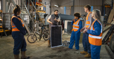 Factory workers learning solar.web